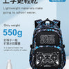 A dark blue and black lightweight backpack with a separate lunch bag is displayed on a white surface.