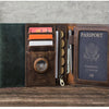 A brown leather passport card holder with multiple slots and a dark blue passport section is displayed on a wooden surface.