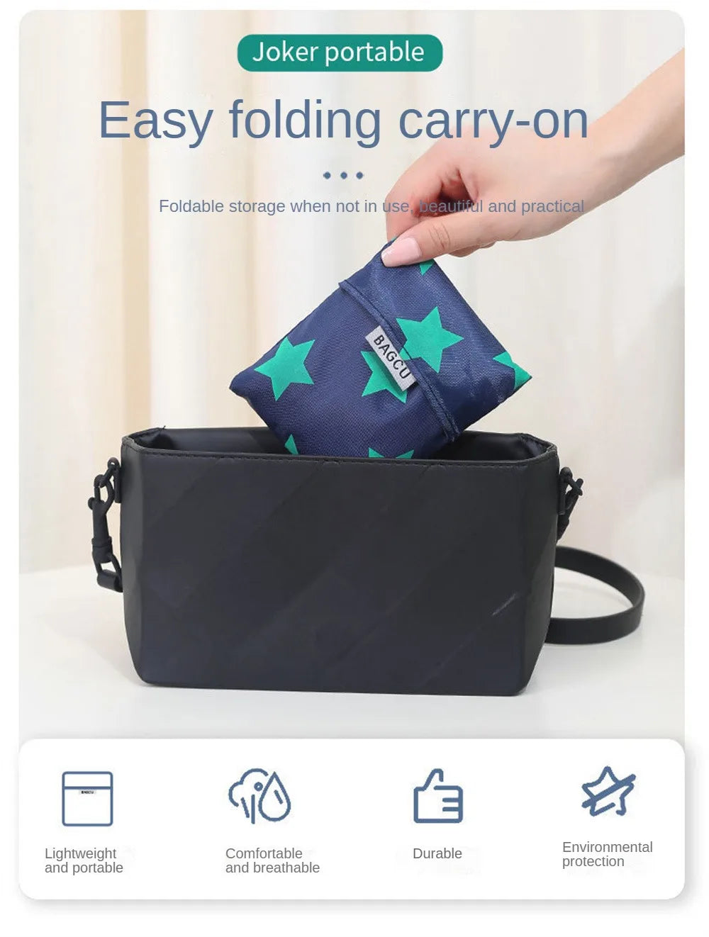 A dark blue foldable carry-on bag is shown being held by a hand, emphasizing its easy folding and portable features.