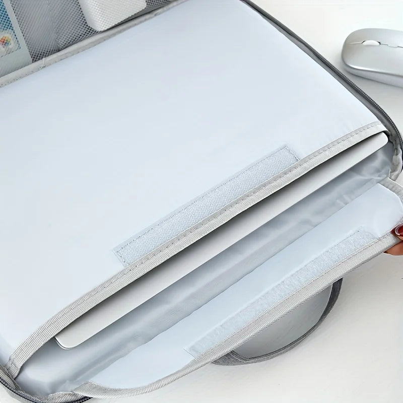 A white premium laptop sleeve designed for Apple and PC devices, shown open.