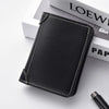 A black ultra-thin PU leather credit card wallet for men lying on a white surface.