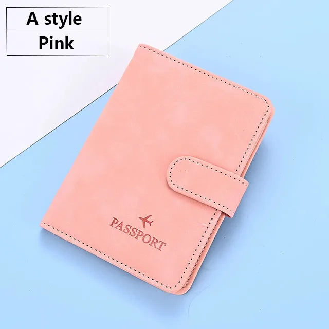 A pink PU leather passport and ID holder cover with a stitched edge shown on a light blue background.