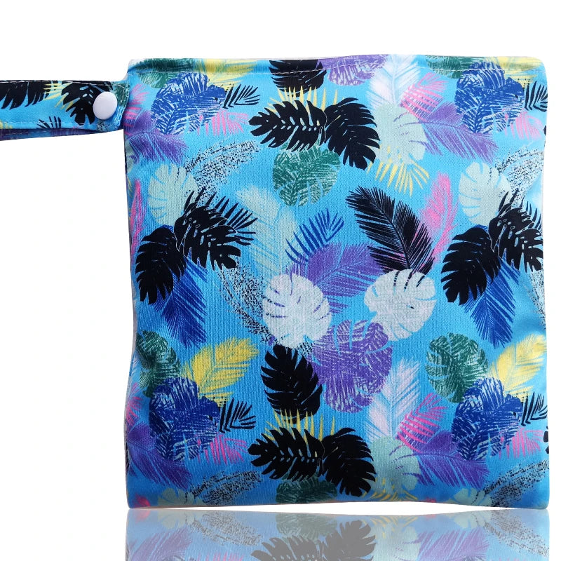 Reusable waterproof snack bags featuring a vibrant floral pattern with blue, purple, and green leaves.