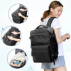 A woman is holding a black expandable vacuum compression travel backpack, showing its features and size.