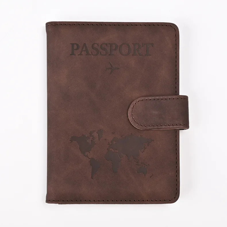 A brown genuine PU leather passport and ticket wallet cover with the word PASSPORT embossed on it.
