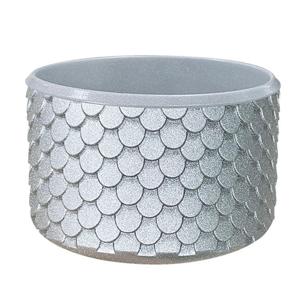 A silver silicone boot sleeve designed to fit water bottles.