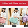 Three methods of displaying a large capacity travel duffle bag: single shoulder, crossbody, and portable.