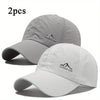 A set of two light gray and white outdoor baseball caps shown against a white background.