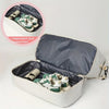 A light-colored travel duffel bag is open, showing an independent compartment holding a pair of green and white shoes.