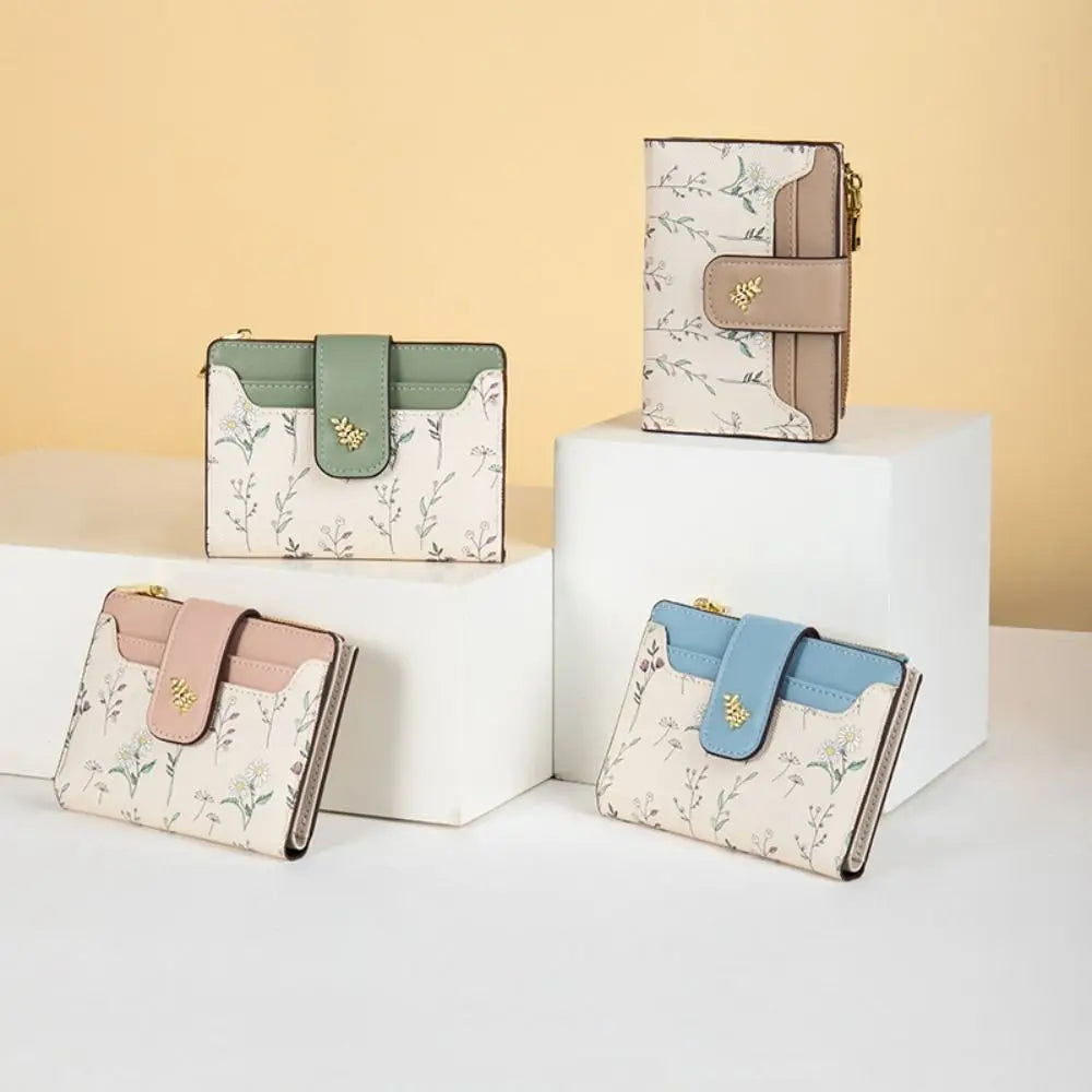 A set of three fashion PU leather slim card holder wallets in beige and light green colors displayed on a white surface.