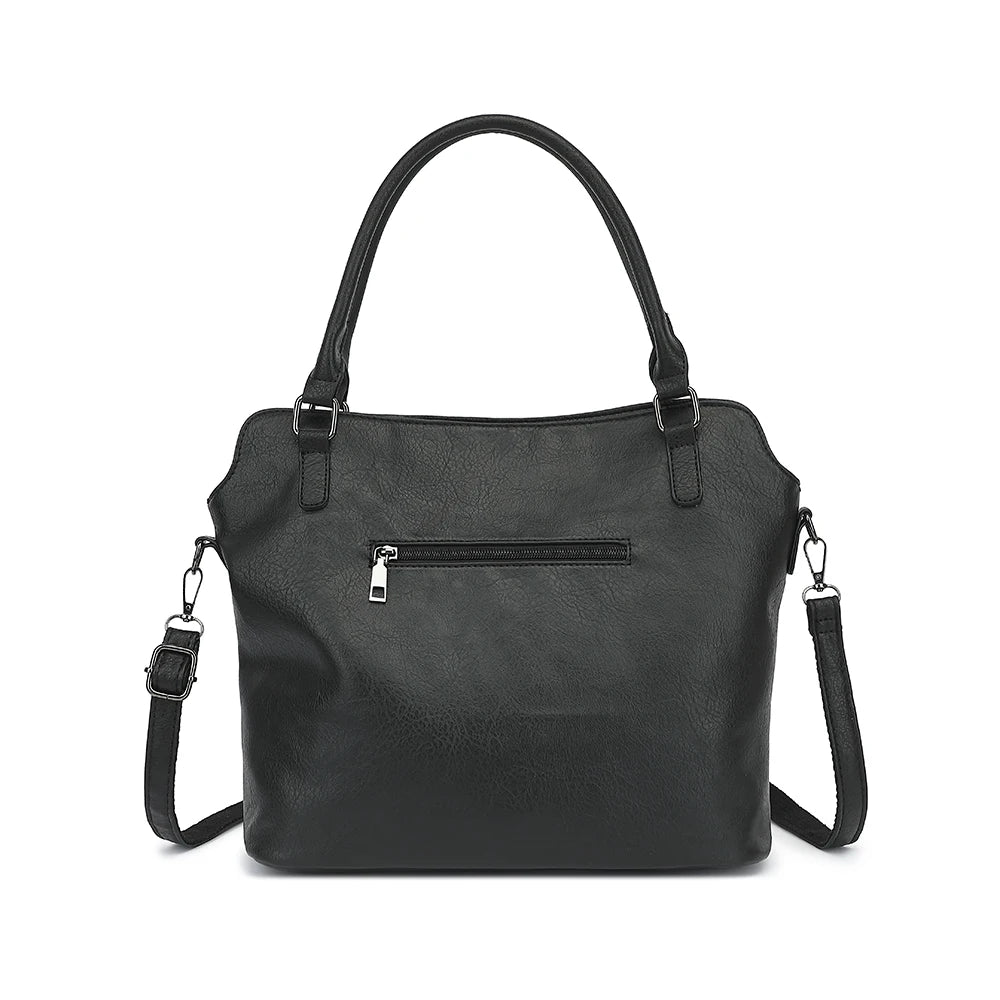 A black women's classic cow print PU leather tote bag with a top handle and shoulder strap.