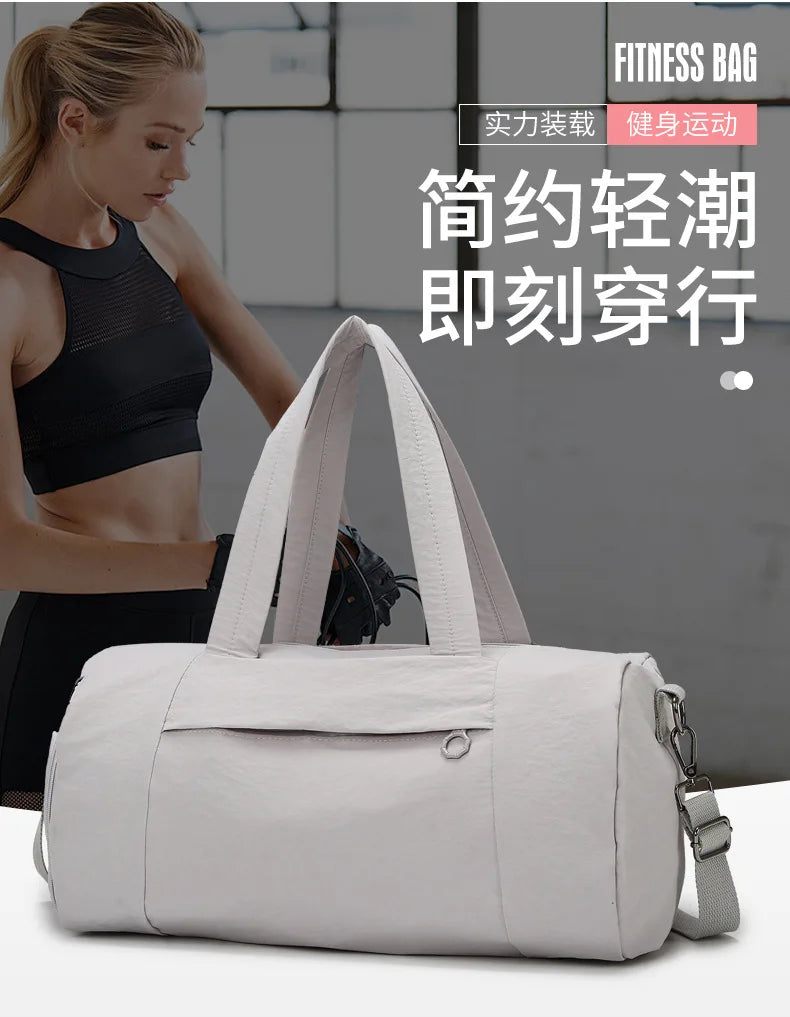 A light beige gym duffel bag is shown next to a woman wearing athletic wear, highlighting its design for sports and travel.