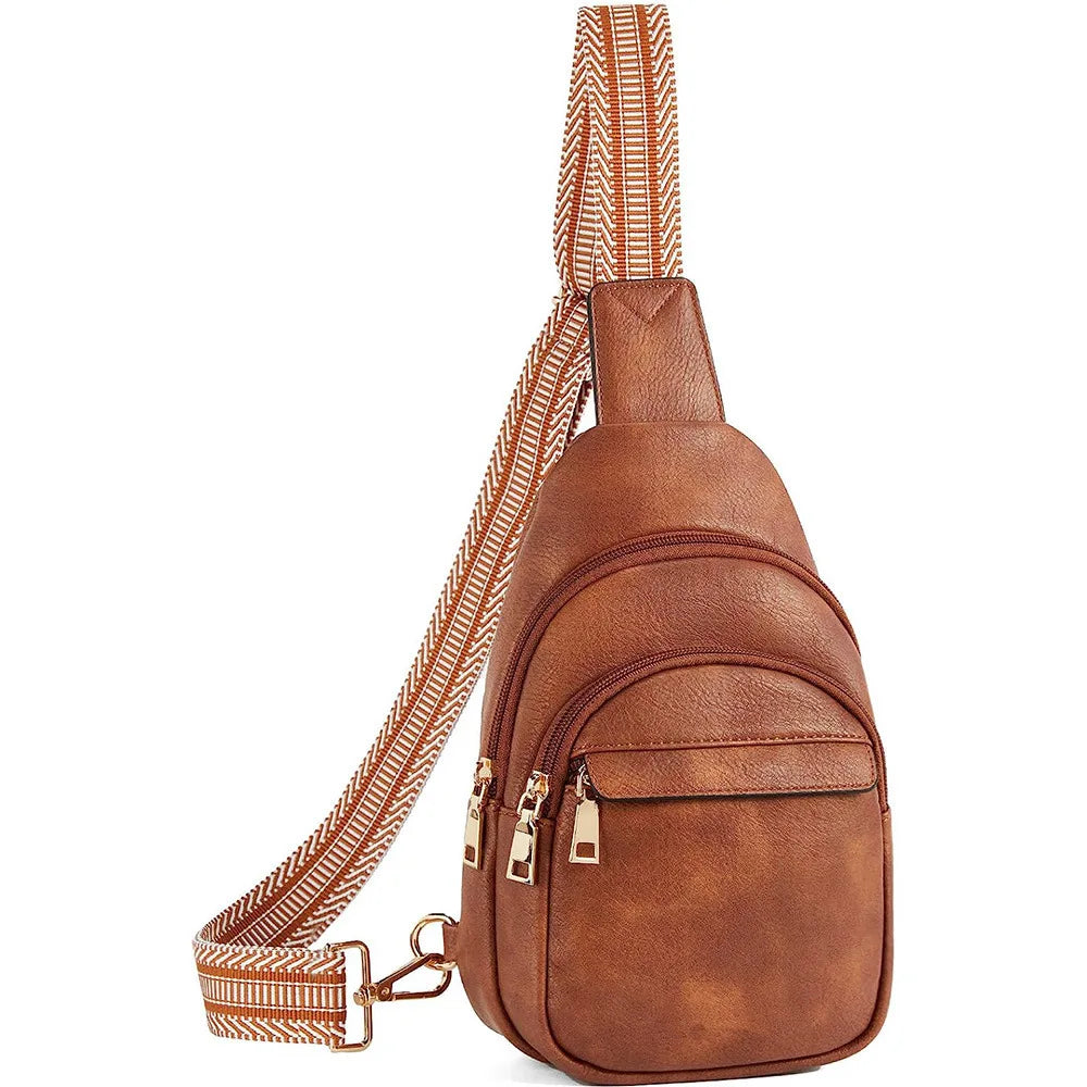 A brown PU leather chest sling bag with a woven strap and gold-toned hardware.