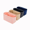Three felt insert liners in pink, beige, and navy blue for handbags.