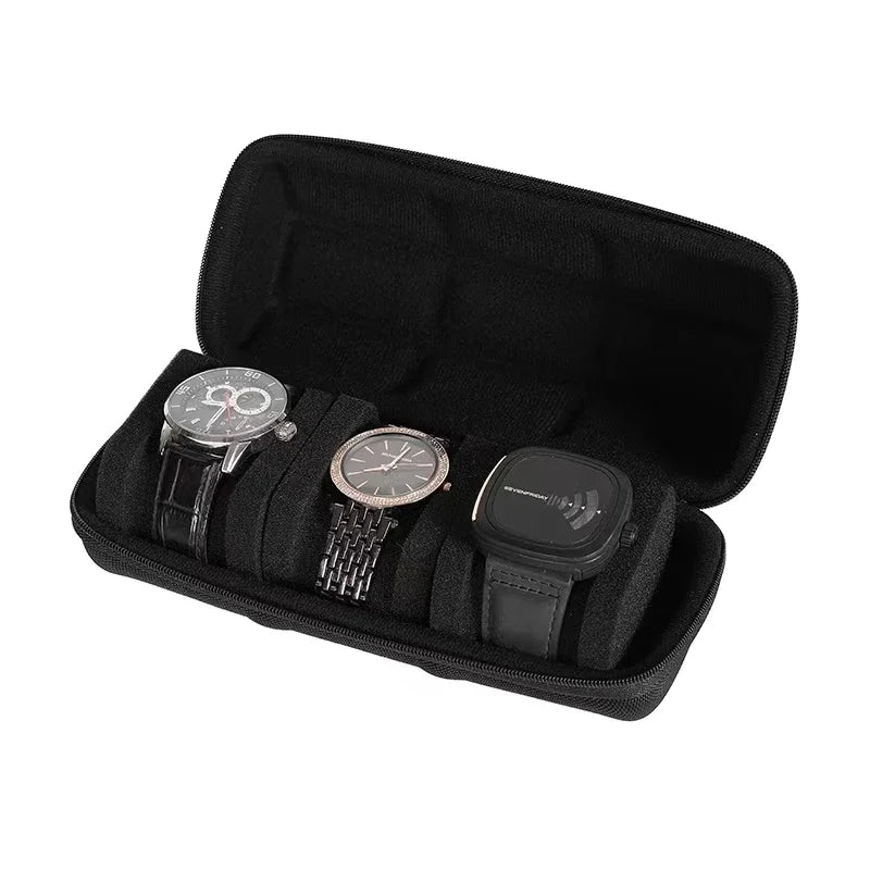 Black watch organizer case with soft lining holding several watches and a smartwatch.