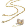Gold stainless steel diamond-cut curb chain strap attached to a small woven clutch bag