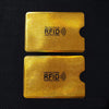 Two gold-colored cards with the text Protection RFID Protection printed on them.