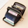 A brown fashion PU leather double zipper wallet is open, displaying various banknotes and cards.
