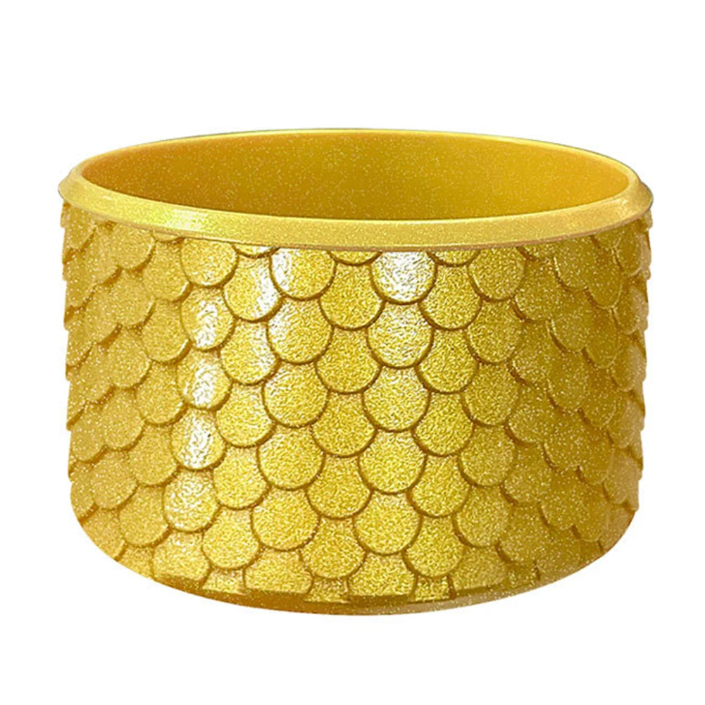 A yellow silicone boot sleeve designed to fit around a water bottle.