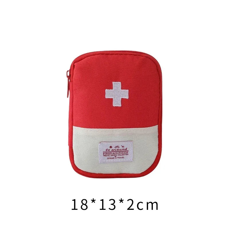 A red pouch-style storage bag for a portable first aid kit with a white cross emblem.