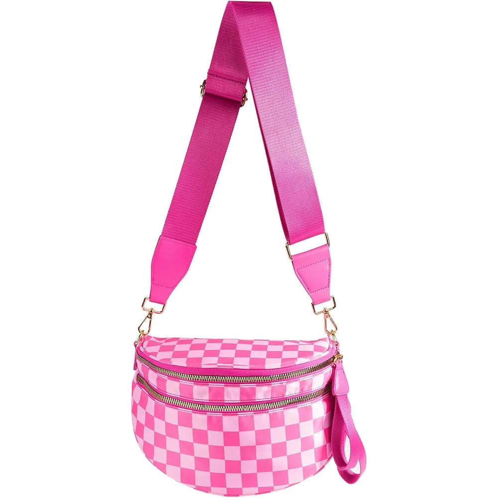 A bright pink checkered crossbody sling bag with an adjustable strap.