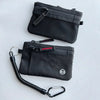 Black RFID blocking travel wallet with a carabiner attached for security