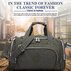 A dark olive green durable nylon travel duffle bag with a padded shoulder strap is shown on a wooden surface.