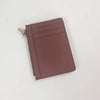 A mauve genuine leather zipper card holder and coin purse displayed on a white background.