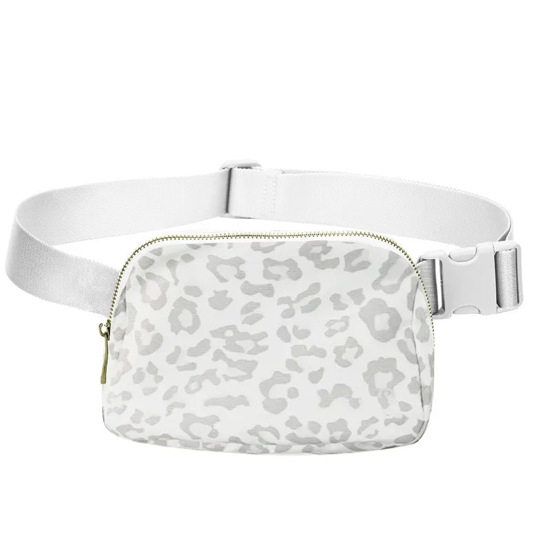 White waist bag or fanny pack with a leopard print pattern