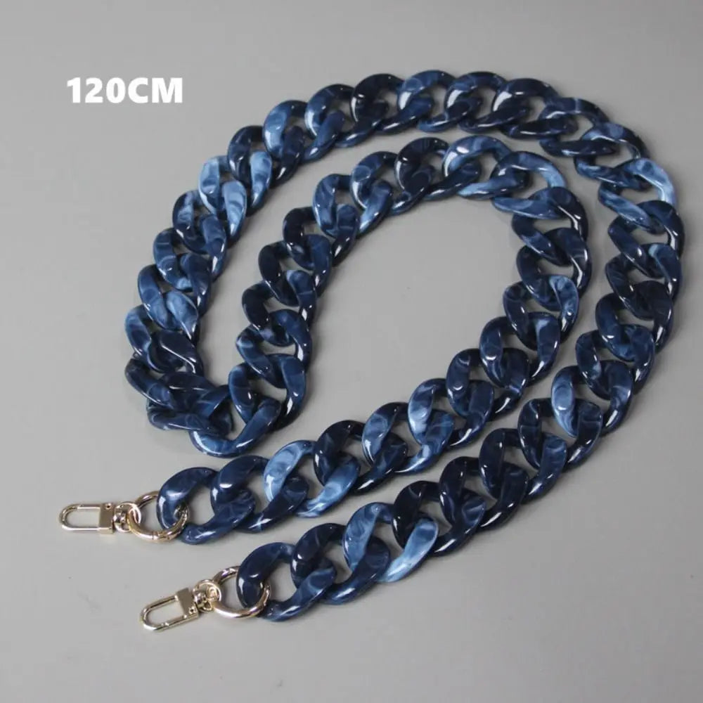 A 120cm long, dark blue acrylic resin detachable bag chain strap.