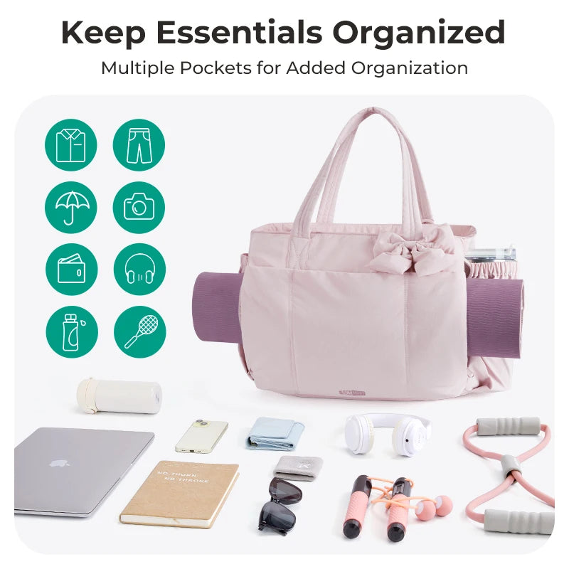 A pink tote bag with multiple pockets and various accessories like a phone, headphones, and small gadgets.
