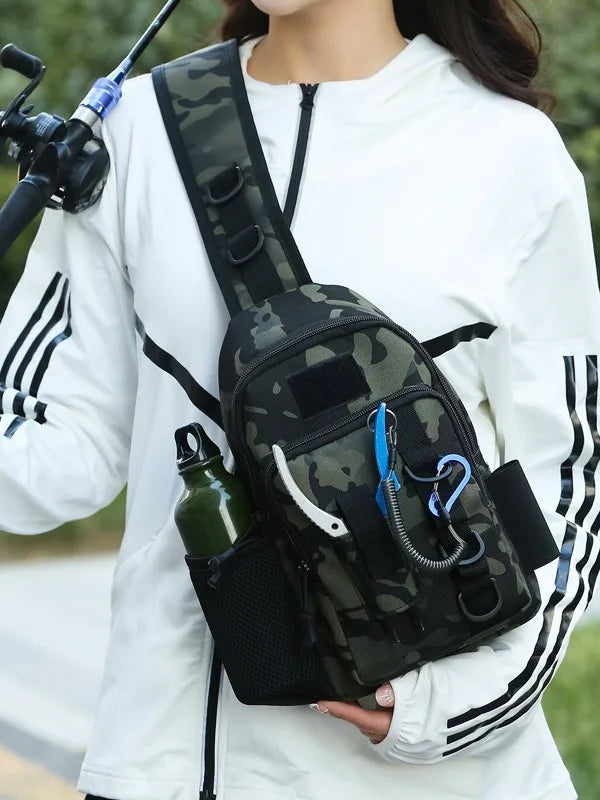 A person holds a camouflage tactical fishing gear storage chest bag against a white long-sleeved shirt.