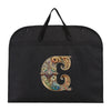 Black fabric dust cover and storage bag with a gold initial letter C embroidered on it.