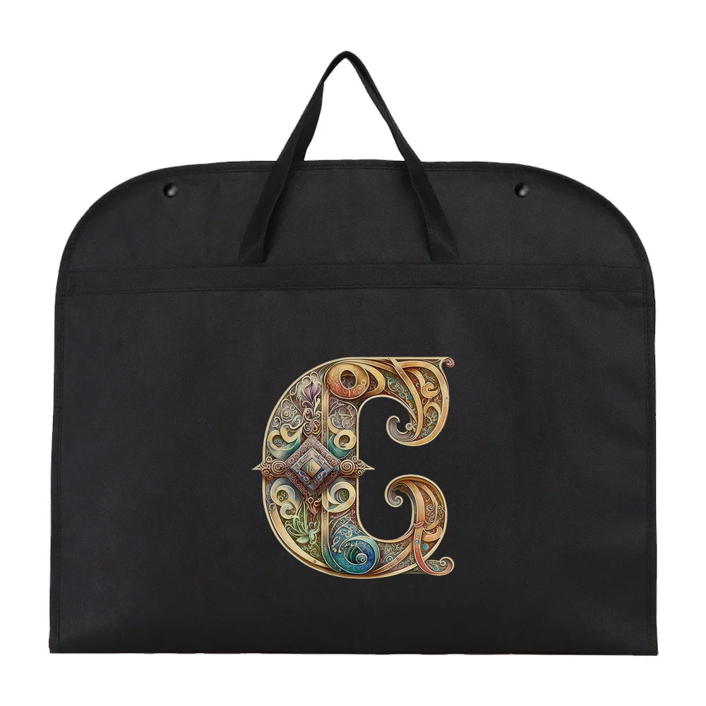 Black fabric dust cover and storage bag with a gold initial letter C embroidered on it.