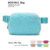 Light blue fleece belt bag shown with various color options.