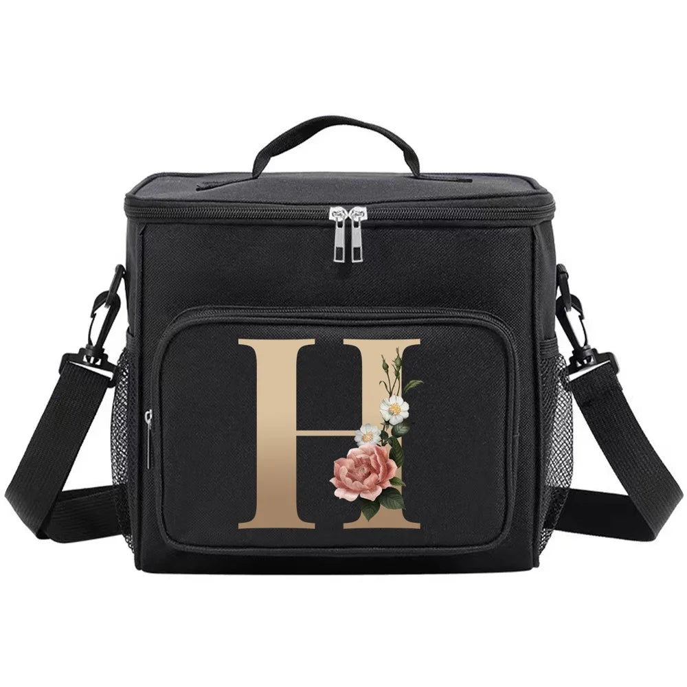Black insulated canvas lunch bag with gold initial H and dual handles