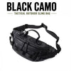 Black camo tactical outdoor sling bag worn by a person.