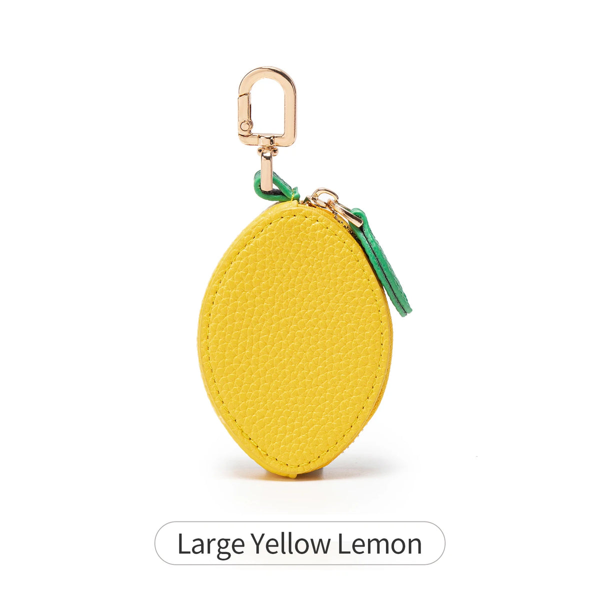 Large yellow lemon coin purse keychain with a gold-colored clasp and green cord.