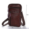 A dark brown vintage cowhide leather crossbody bag with a zippered compartment and adjustable strap.