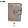A gray multi-fold RFID protection wallet with a leather texture and a decorative emblem.