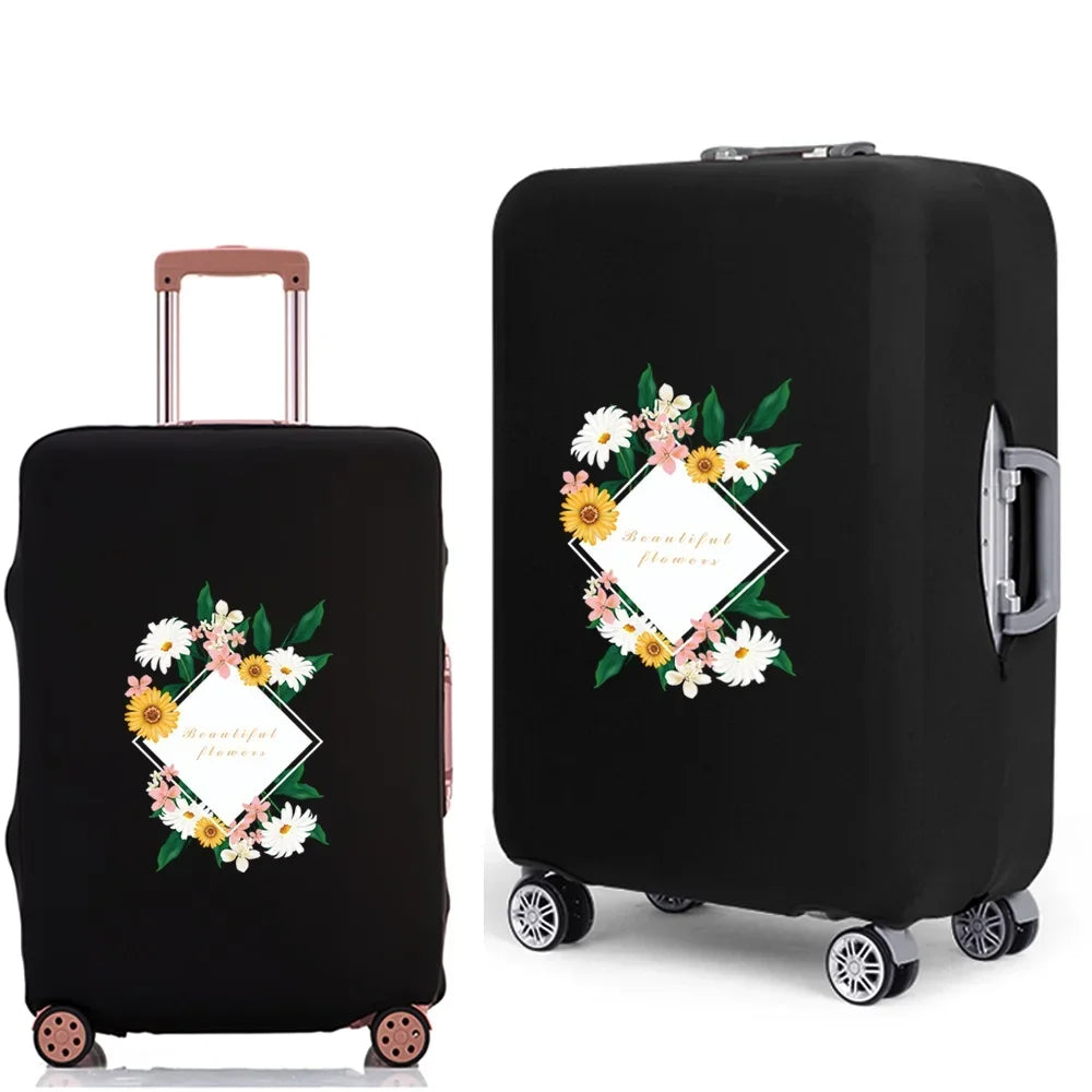 Black rolling suitcase with a floral design on the side.