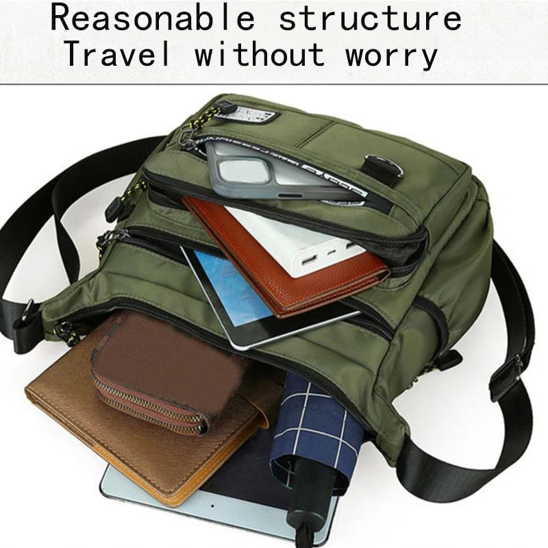 A olive green men's business crossbody bag filled with papers and a tablet.