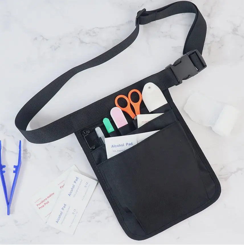 Black nurse organizer belt waist bag with multiple pockets and various medical tools