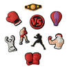 A set of decorative shoe charms and pins featuring boxing themes including a boxing glove pin, a boxing emblem, and a boxing 