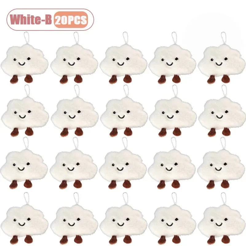 A set of 20 white cloud-shaped plush keychains and brooch pins.