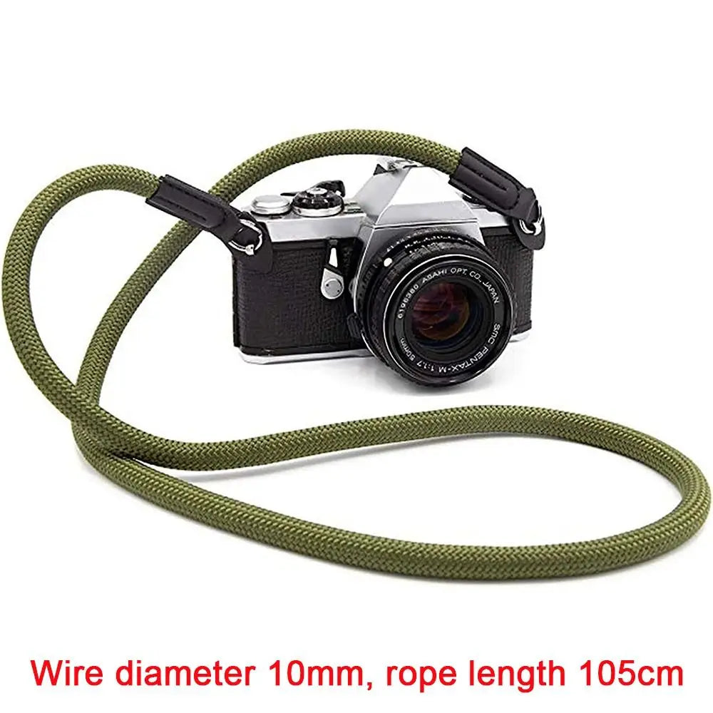 A black camera mounted on a green rope strap with a 10mm wire diameter and 105cm length.