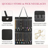 A black fabric organizer with multiple strands of necklaces and jewelry displayed for easy storage and picking.