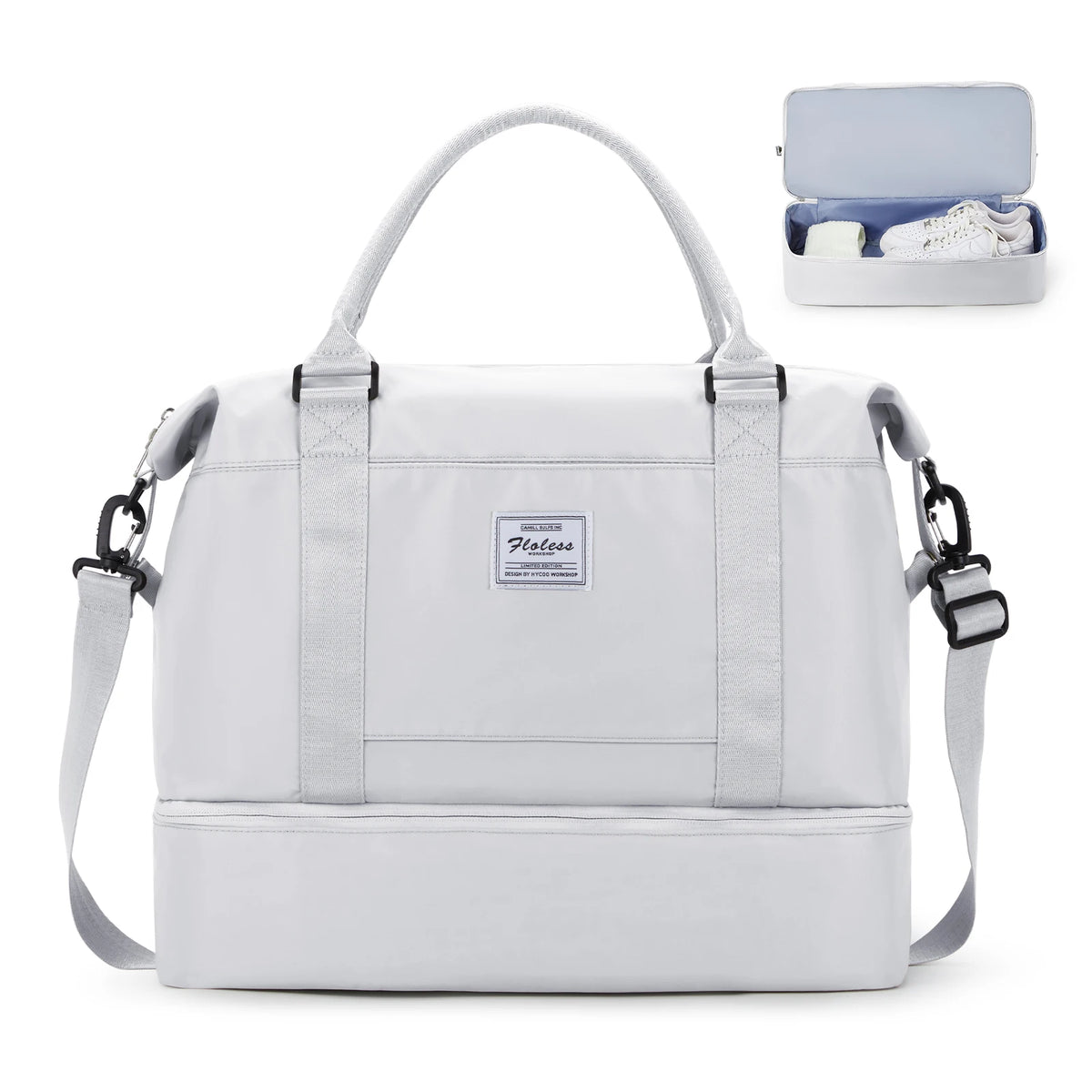Maleta de viaje blanca grande con asa y correas, junto a un compartimento abierto mostrando zapatos