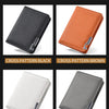 A display of five cross-pattern card wallets in black, brown, white, and gray.