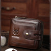 A brown leather wallet is shown open, displaying a striped design, resting on a wooden surface.